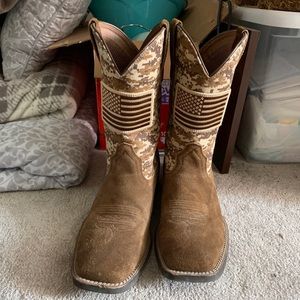 Ariat brown and tan cowboy boots.
